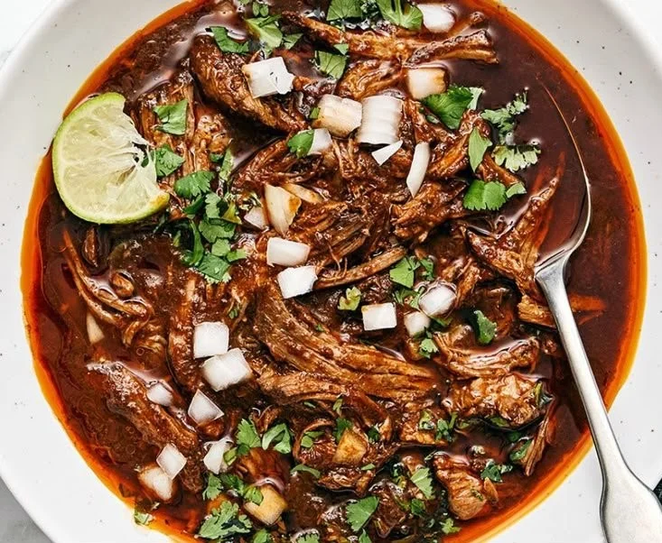 Delicious Mexican Birria Crockpot dish served in a bowl